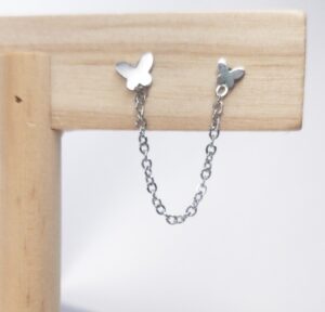 Pendientes trepadores mariposas en color plateado